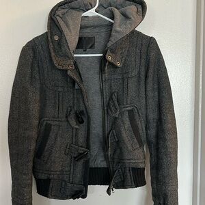 Gray/black jacket size XS. Brand MP Black. Zipper and buttons. Hood.